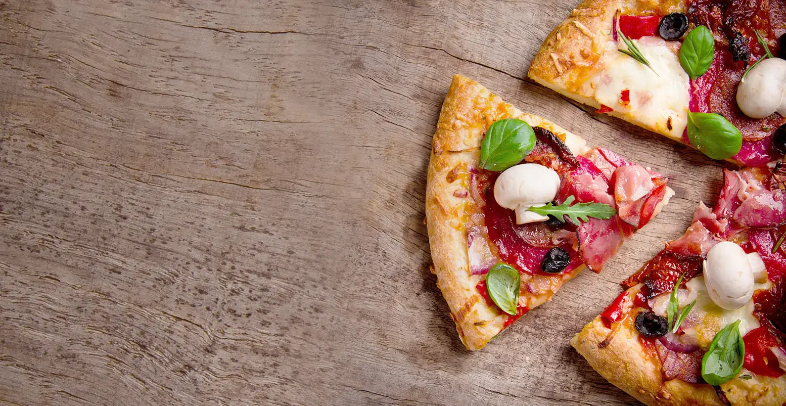 a pizza with fresh mozzarella, basil and other delicious ingredients, on the perfect crust